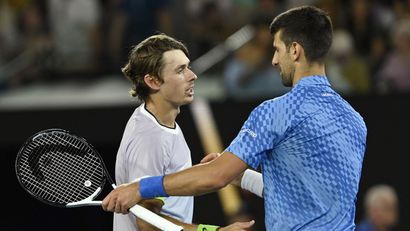 Aleks de Minor i Novak Đoković (©Reuters)