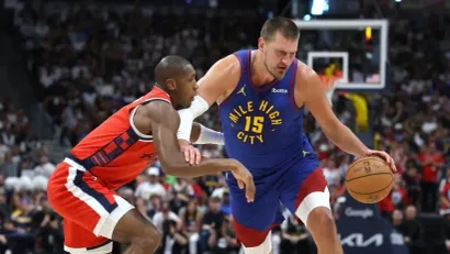 Kris Dan i Nikola Jokić (AFP)