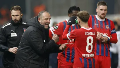 Šmit i igrači Hajdenhajma (©Reuters)