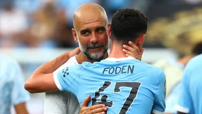 Pep Gvardiola i Fil Foden (Reuters)