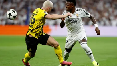 Julijan Rijerson (Dortmund) i Vinisijus Žunior (Real Madrid)