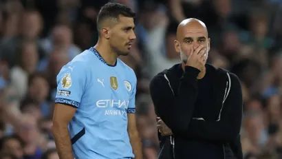 Rodri i Pep Gvardiola (©Reuters)