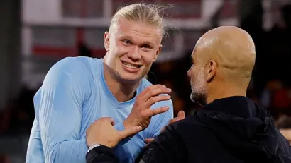 Erling Haland i Pep Gvardiola (©Reuters)