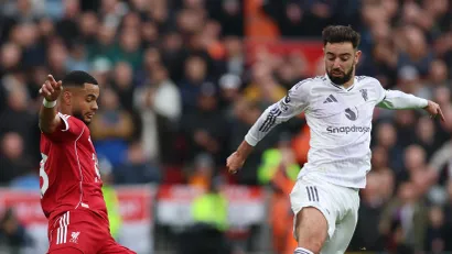 Kodi Gakpo i Bruno Fernandes (Reuters)