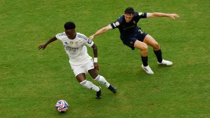 Vinisijus Žunior (Real Madrid) i Andrea Kambijazo (Juventus)