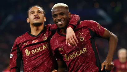 Leroj Sane i Viktor Osimen (©Reuters)