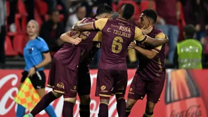 Igrači Deportes Tolime (©AFP)