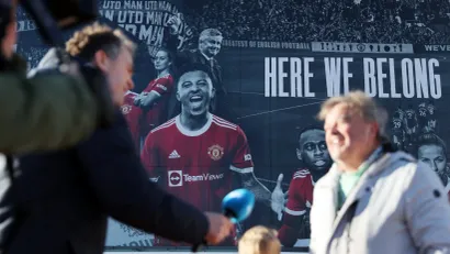 Solskjer i Sančo na posteru (©Reuters)