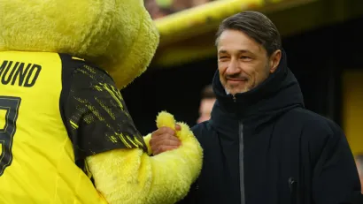 Niko Kovač sa maskotom Milionera (©Reuters)