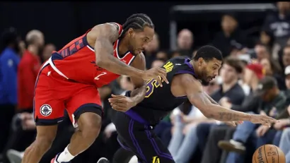 Kavaj Lenard i Markus Smart (AFP)