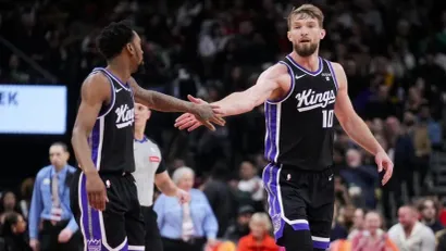 Malik Monk i Domantas Sabonis (©AFP)