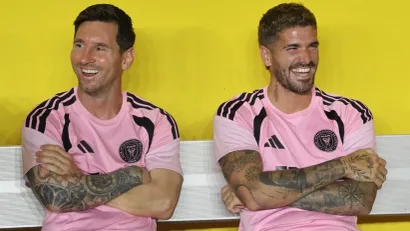 Lionel Mesi i Rodrigo de Pol (©AFP)