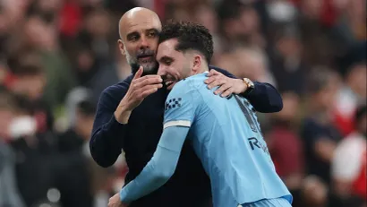 Pep Gvardiola i Rajan Šerki (©Reuters)