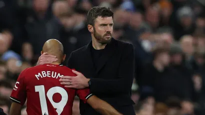 Brajan Embeumo i Majkl Kerik (Reuters)