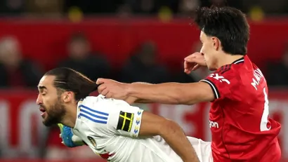 Dominik Kalvert Luin i Lisandro Martinez (©Reuters)