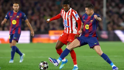 Ademola Lukman (Atletiko Madrid) i Robert Levandovski (Barselona)