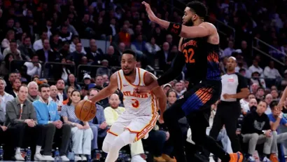 ©AFP (Si Džej Mekolum i Karl Entoni Tauns)