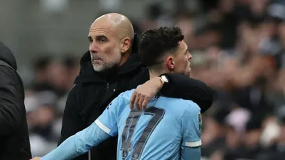 Pep Gvardiola i Fil Foden (Reuters)