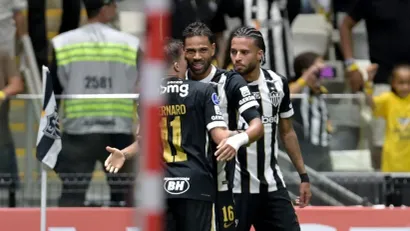 Renan Lodi i Bernard (©AFP)