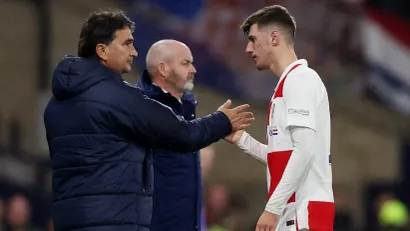 Zlatko Dalić i Petar Sučić (©Reuters)