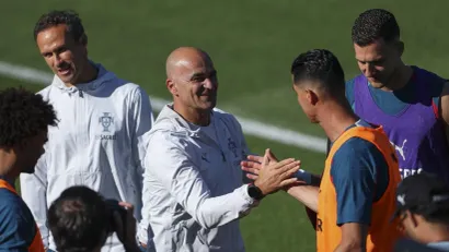 Roberto Martinez i Kristijano Ronaldo (©AFP)
