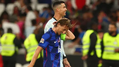 Luka Modrić i Kristijano Ronaldo (©Reuters)