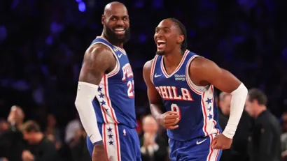 ©AFP (Lebron Džejms i Tajris Maksi)