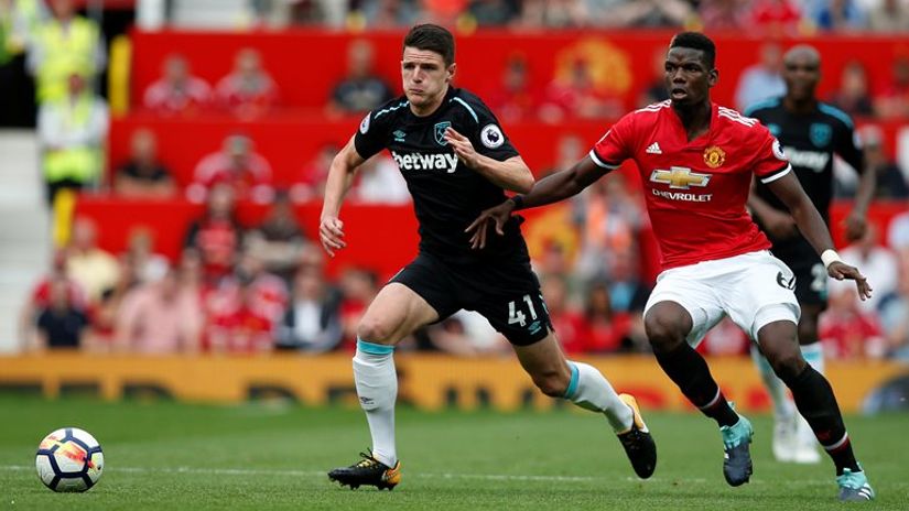 Deklan Rajs (Vest Hem) i Pol Pogba (Man. Junajted)