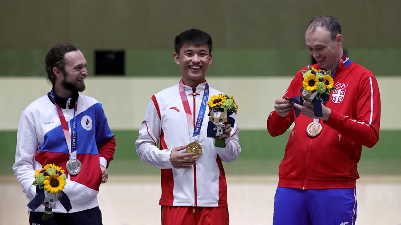 Osvajači olimpijskih medalja u trostavu (©Reuters)