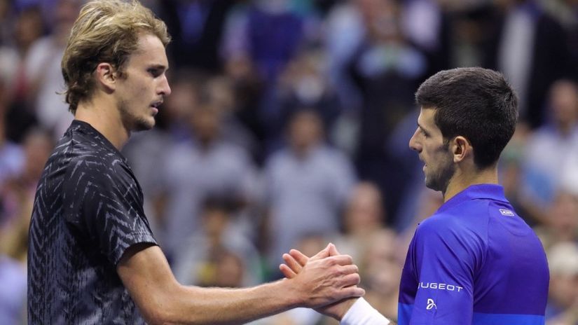 Zverev i Đoković (AFP)