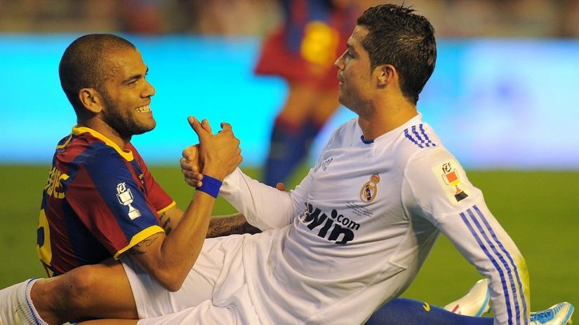 Dani Alves i Kristijano Ronaldo (©Reuters)