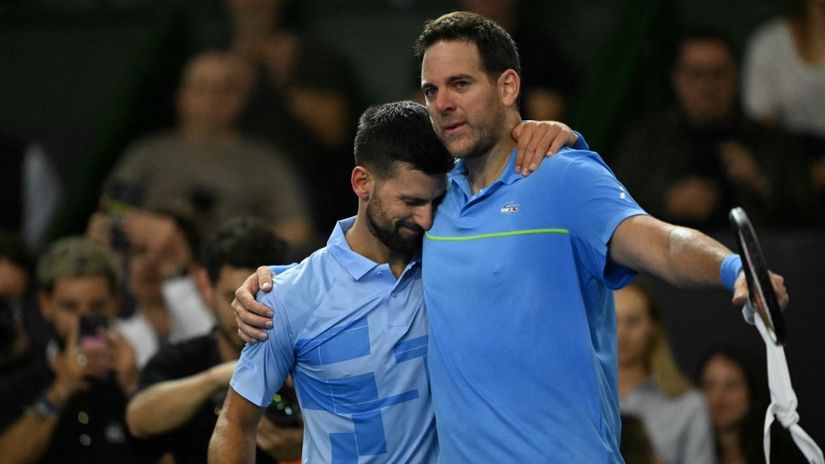 Novak Đoković i Huan Martin Del Potro (AFP)