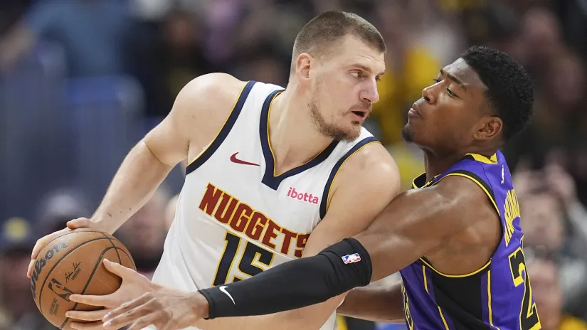 Nikola Jokić i Rui Hačimura (Guliver/AP Photo/David Zalubowski)