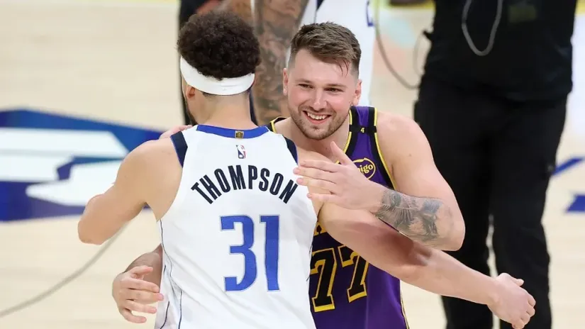 Klej Tompson i Luka Dončić (©AFP)