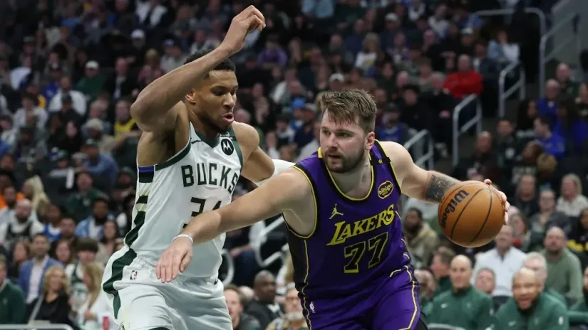 Luka Dončić i Janis Adetokunbo (©AFP)