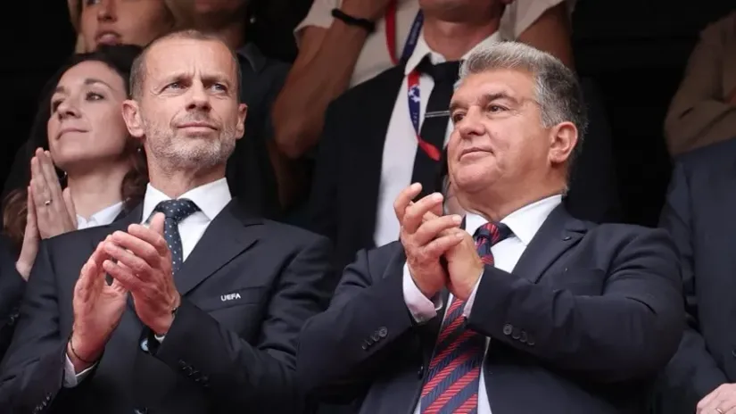 Čeferin i Laporta (AFP)