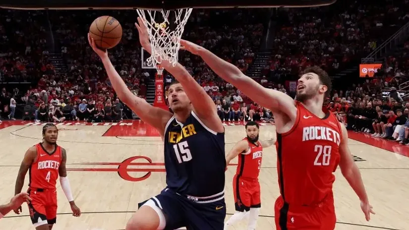 Alperen Šengun i Nikola Jokić (AFP)