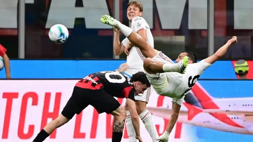 Federiko Bonacoli hvata makazice (©AFP)