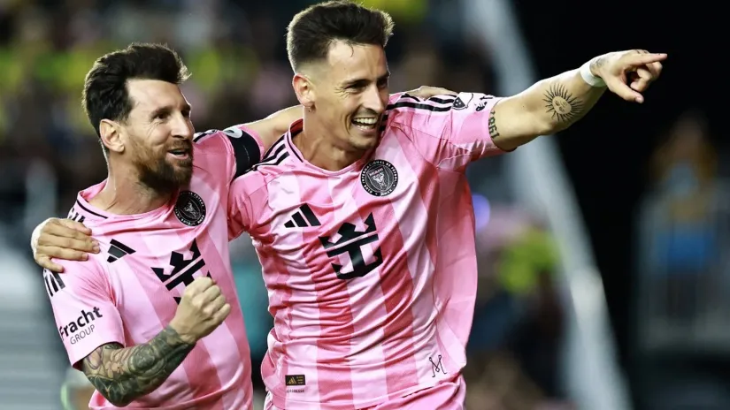 Lionel Mesi i Tadeo Aljende (©AFP)