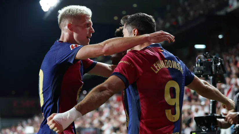 Olmo i Levandovski (©Reuters)