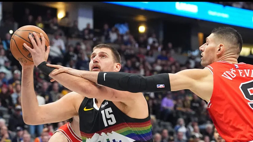 Nikola Jokić i Nikola Vučević (Guliver/AP Photo/David Zalubowski)