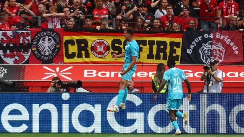 ©Reuters (Fisnik Aslani slavi gol protiv Leverkuzena)