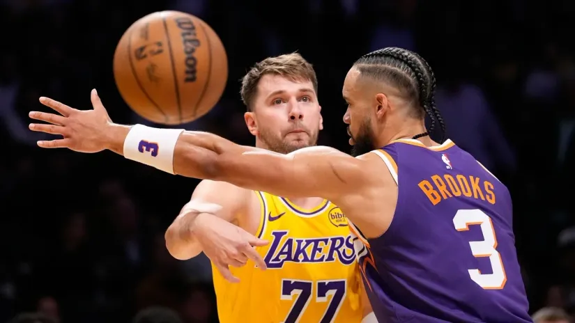 Luka Dončić i Dilon Bruks (©Guliver Image/AP Photo/Mark J. Terrill)