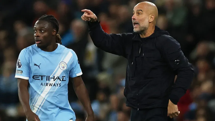 Doku i Gvardiola (©Reuters)