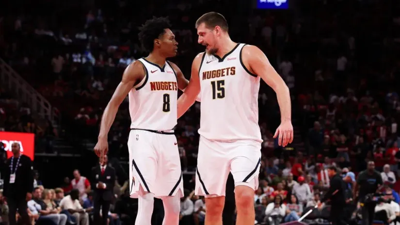 Pejton Votson i Nikola Jokić (©AFP)