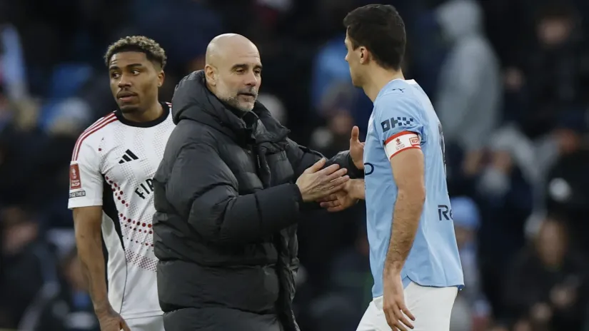 Pep Gvardiola i Rodri (©Reuters)