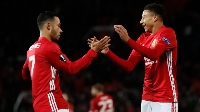 Memfis Depaj i Džesi Lingard (©Reuters)