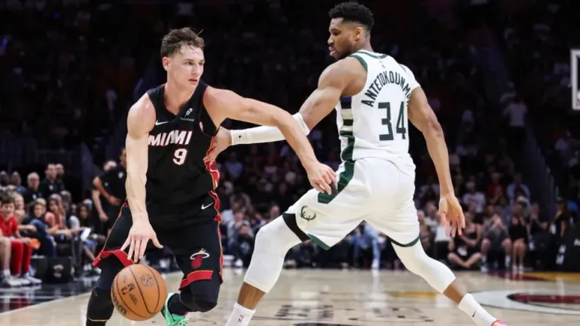 Pele Larson protiv Janisa Adetokunba (AFP)