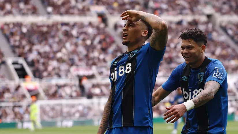 Markus Tavernije i Evanilson (©Reuters)