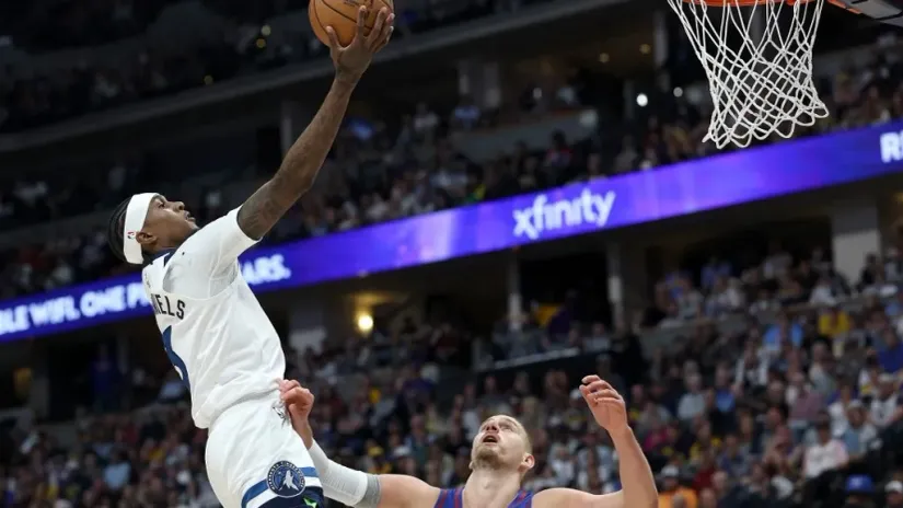 Džejden Mekdenijels i Nikola Jokić (©AFP)